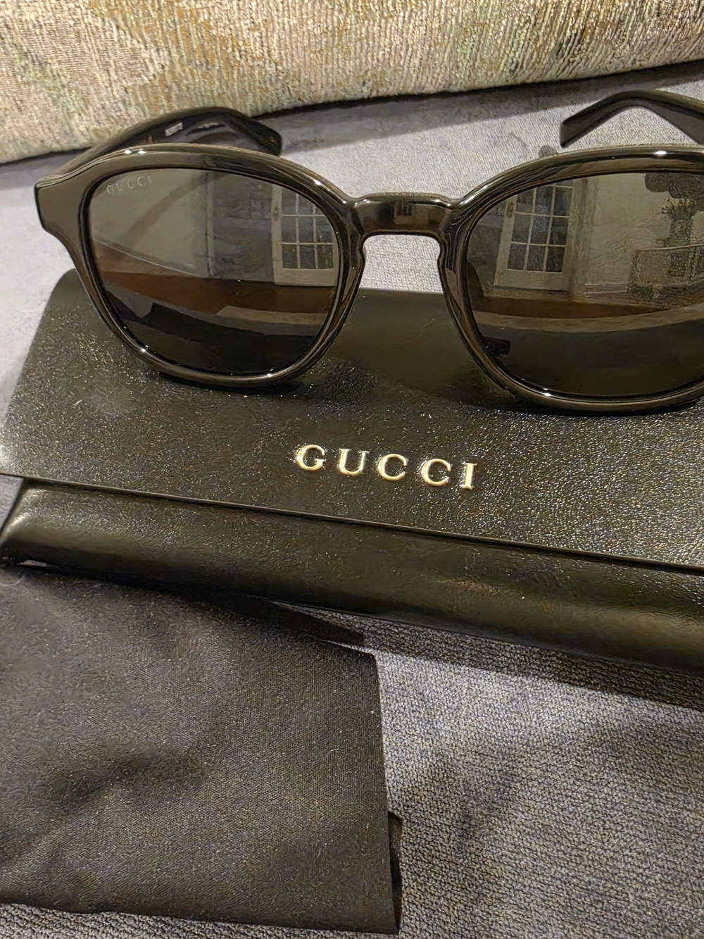 Gucci Black Round Frame Sunglasses with Dark Lenses